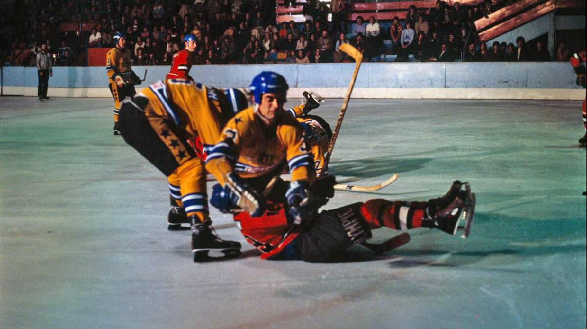 Sandi Logan from the Sydney All Stars taking down an opponent in the Australian NIHL in 1980. Picture: supplied
