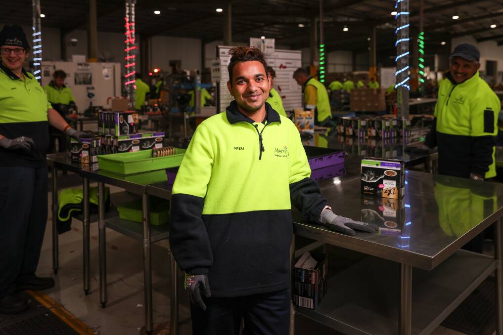 HAPPY PLACE: Bhutanese migrant Prem Khadka, 28, has found confidence and a sense of purpose after settling in Albury and working at Merriwa's Wodonga facility as a production line worker. Pictures: JAMES WILTSHIRE 