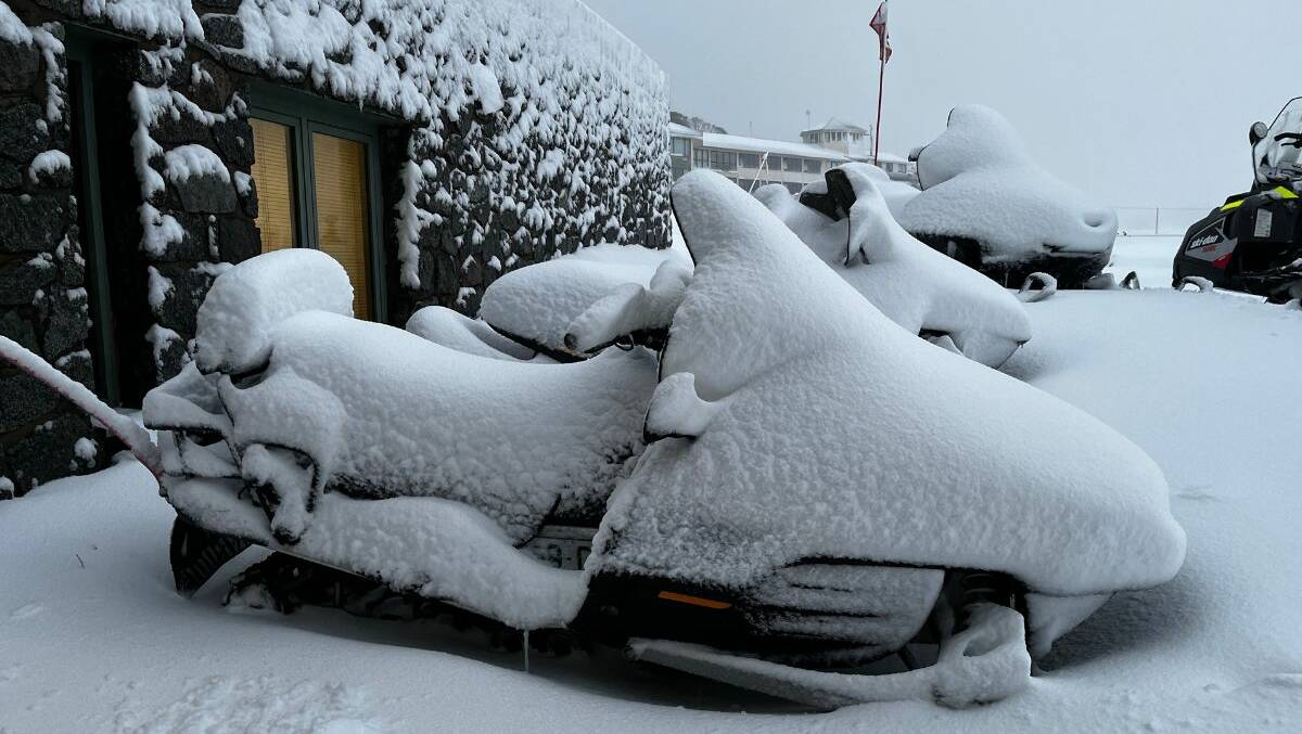 Skidoos covered in snow. Picture Perisher