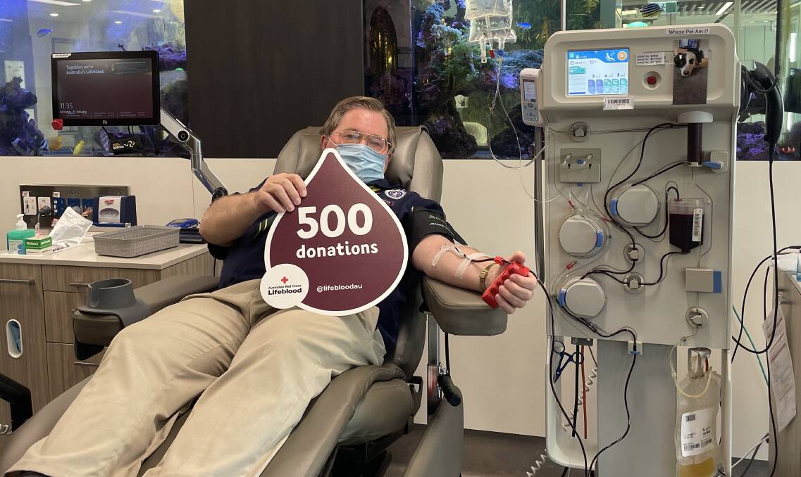 Neville Tomkins donating blood for the 500th time. Picture: Soofia Tariq 