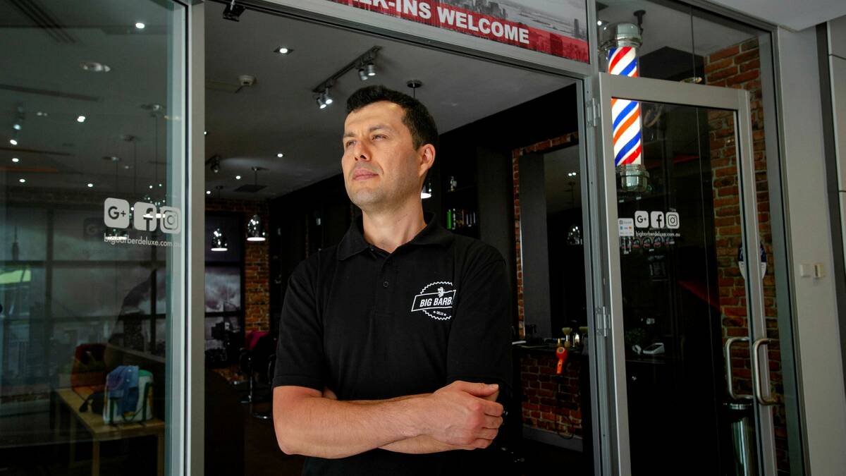 Owner of three Big Barber franchises, Jasur Qaimov. Picture by Elesa Kurtz