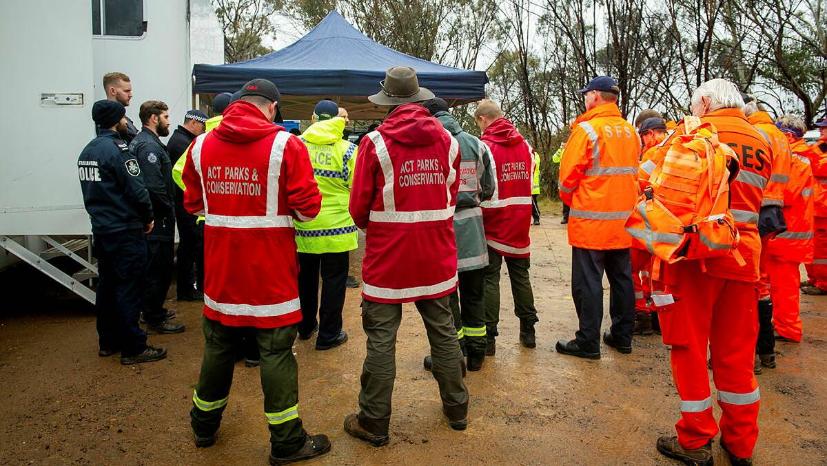Australian Federal Police officers with ACT SES, Ambulance Service and Parks and Conversation workers at the search and rescue training exercise at Namadgi National Park. Picture by Elesa Kurtz