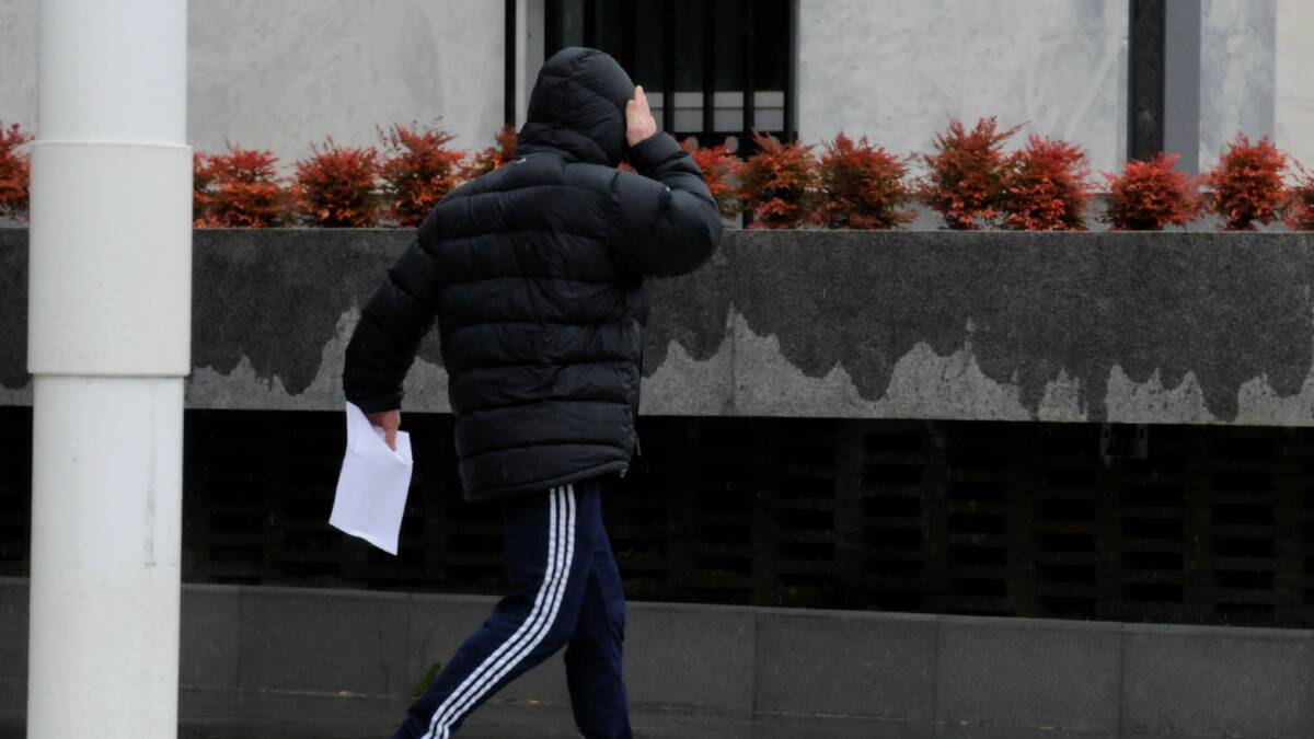 Aubrey Agostino storms away outside the ACT Magistrates Court after being granted bail on Thursday. Picture: Soofia Tariq