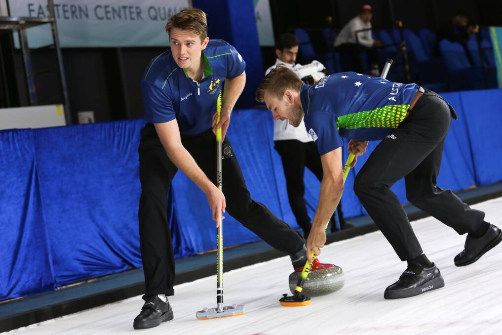 Matt Millikin (left) competing in the men's pairs for Australia. Picture by WCF - Tom Rowland