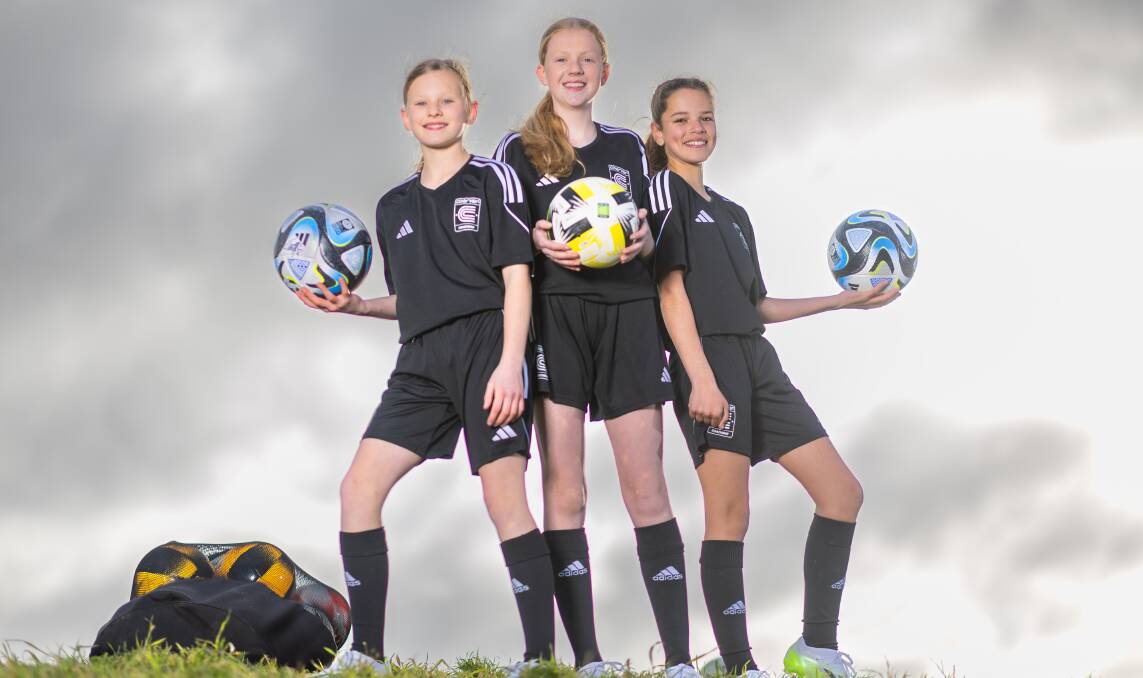 The three girls are part of the 250 ballkids at the Women's World Cup in Australia and New Zealand. Picture by Gary Ramage