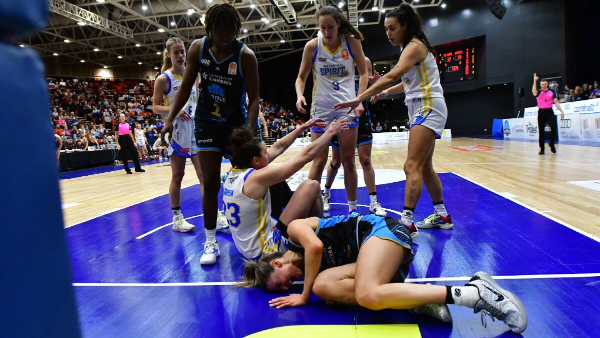 Capitals star Gemma Potter went down with a leg injury in the first quarter. Picture by Elesa Kurtz.