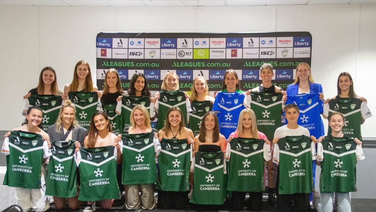 Canberra United players pose with their new jerseys. Picture Canberra United