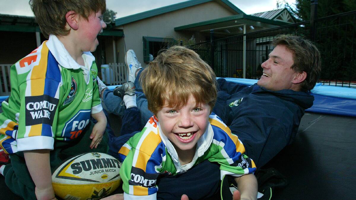 Simon Woolford in 2004 with his sons Charlie and Zac. Picture by Ben Macmahon