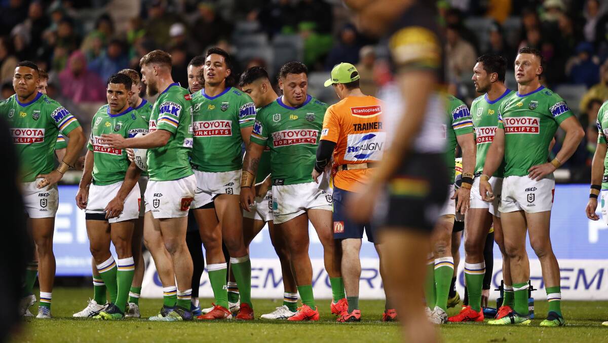 Canberra Raiders players look dejected after a Panthers try. Picture: Keegan Carroll