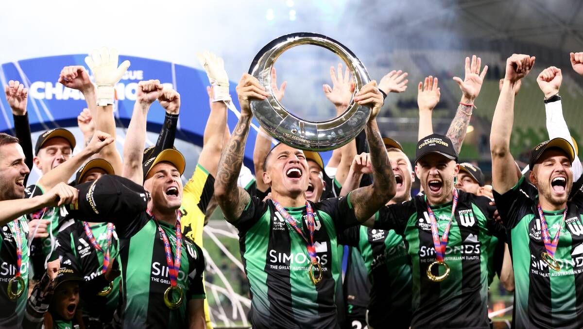 Western United players celebrate winning the A-League grand final against Melbourne City at AAMI Park. Picture Getty Images