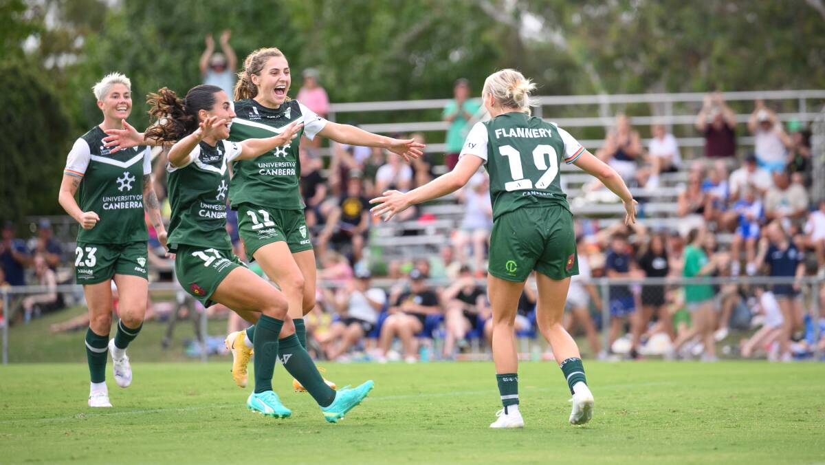 Canberra United players celebrate a goal by Nickoletta Flannery. Picture by Sitthixay Ditthavong