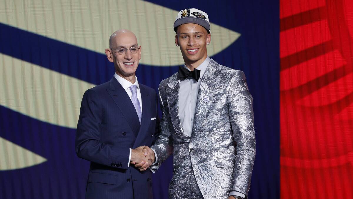 Dyson Daniels (right), with NBA commissioner Adam Silver, was selected eighth overall in the 2022 NBA Draft by the New Orleans Pelicans. Picture: Getty Images