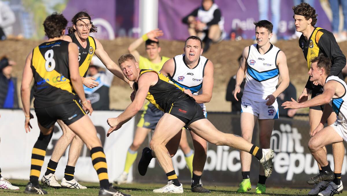 Belconnen Magpies and Queanbeyan Tigers in the men's AFL Canberra first-grade grand final this year. Picture by Keegan Carroll