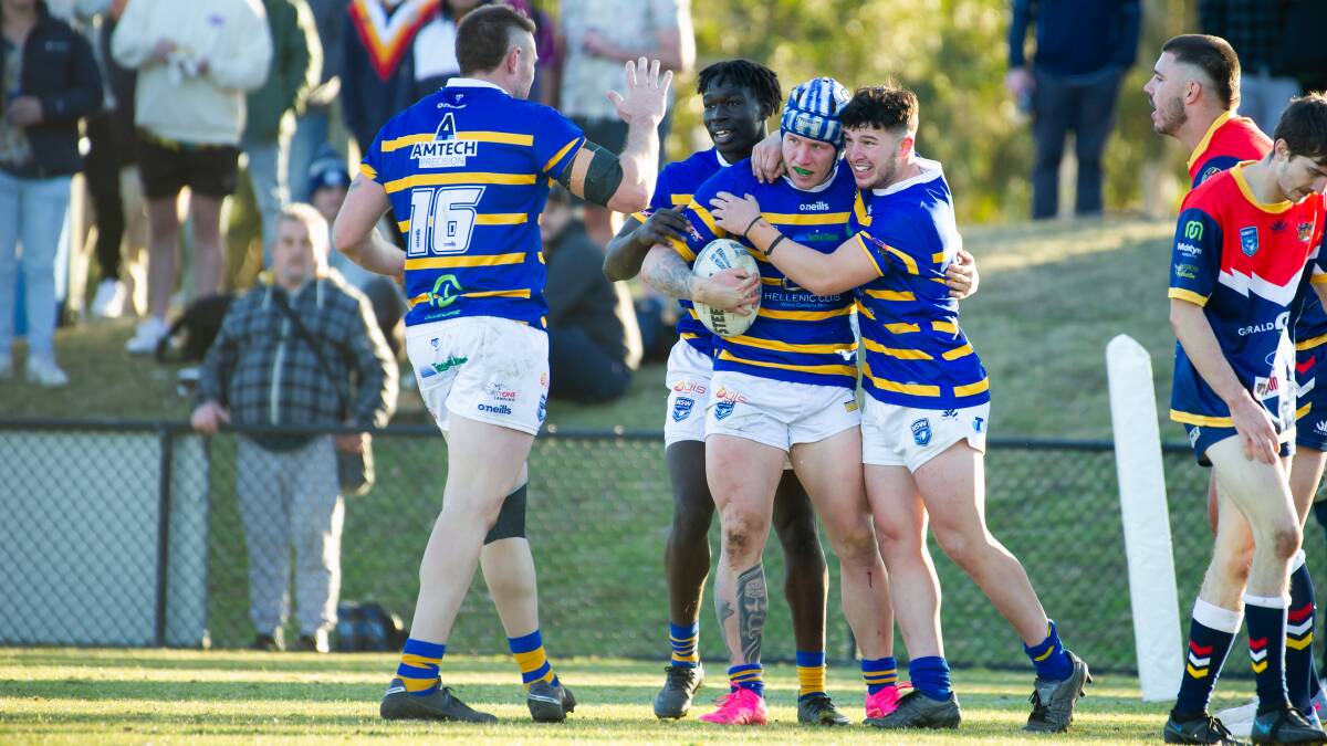 Woden Valley's Daine Spencer celebrates a try. Picture by Elesa Kurtz