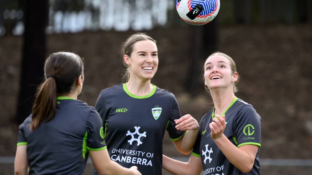 Emma Ilijoski, Alex McKenzie, and Maia Cameron at Canberra United training. Picture by Sitthixay Ditthavong