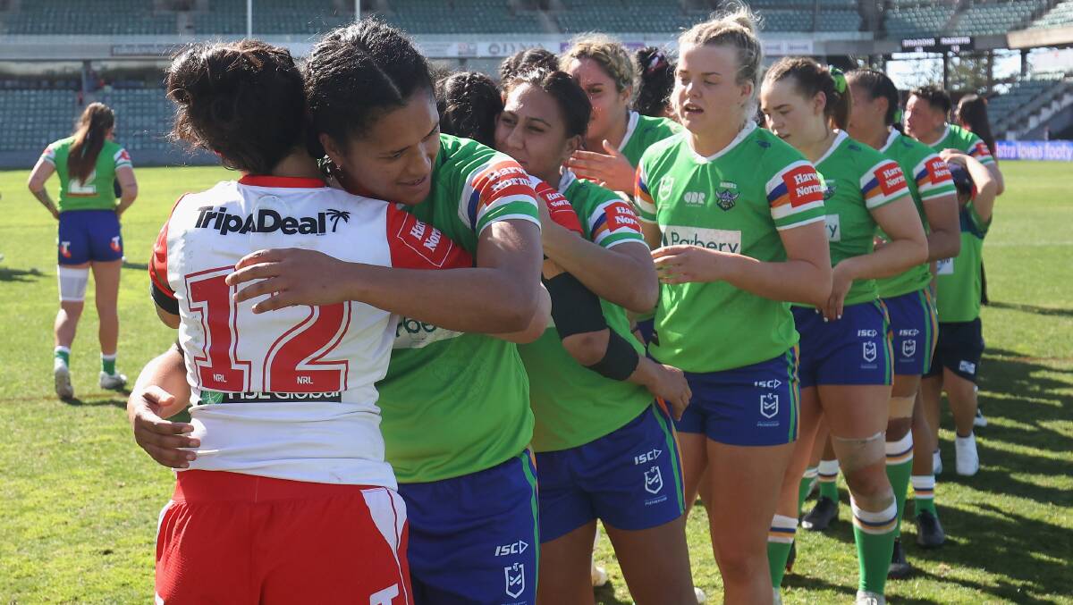 Canberra's match-winner Zahara Temara is congratulated after the game by the Dragons. Picture Getty Images