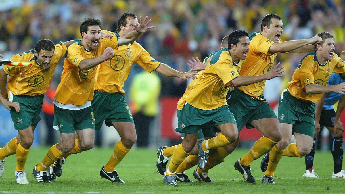 The Socceroos celebrate after qualifying for the 2006 World Cup. Picture: Getty Images