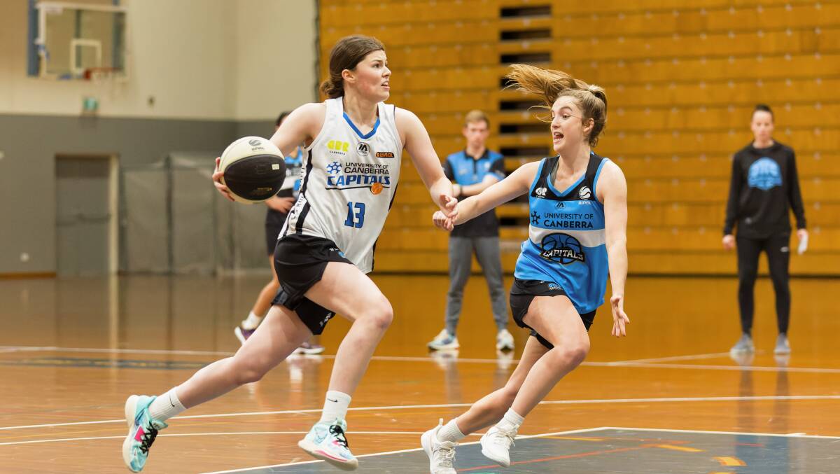 Jade Melbourne and Abby Solway at Canberra Capitals training. Picture by Sitthixay Ditthavong