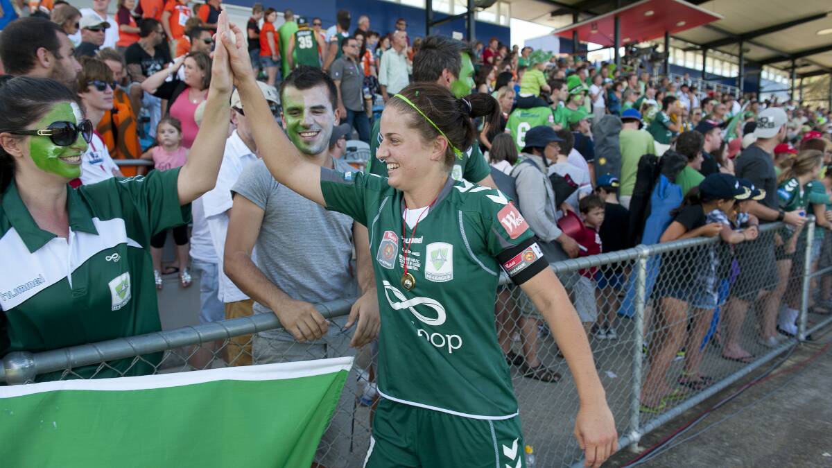 Ellie Brush celebrated their W-League grand final win in 2012. Picture by Gary Schafer.
