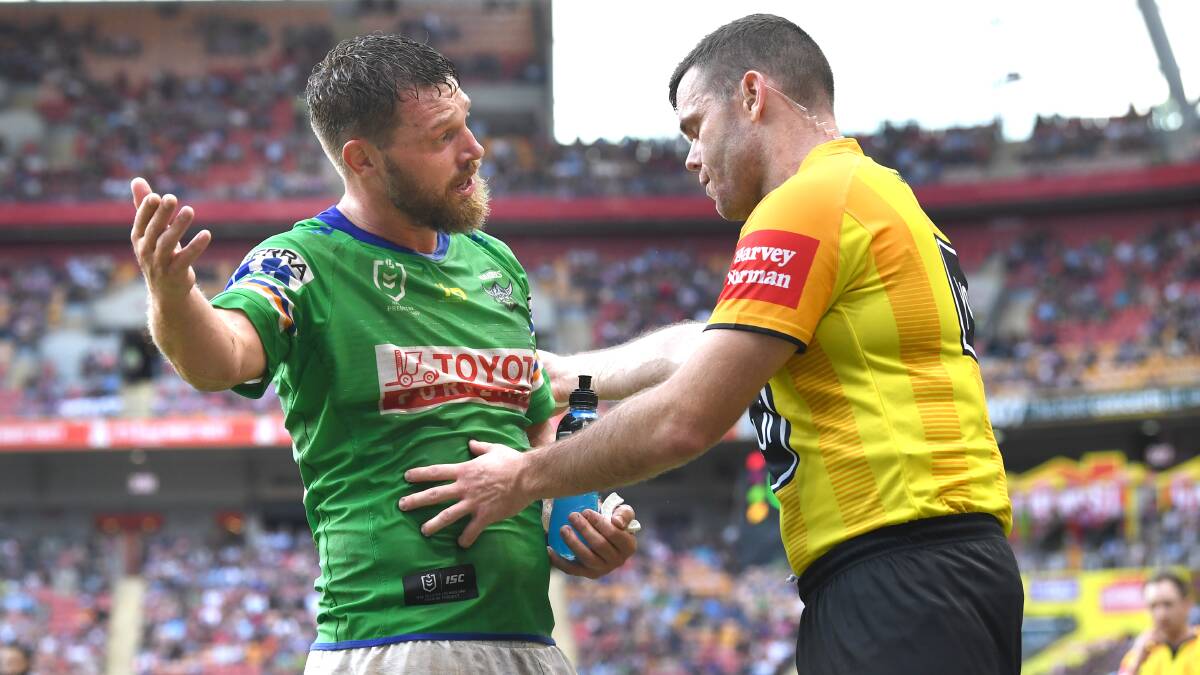 Elliott Whitehead protests to referee Liam Kennedy. Picture: AAP