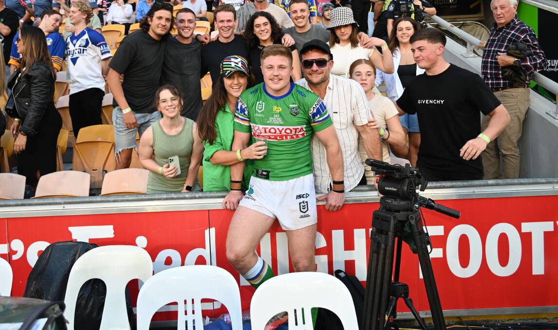 Woolford with his family and loved ones after his debut. Picture: Raiders Media