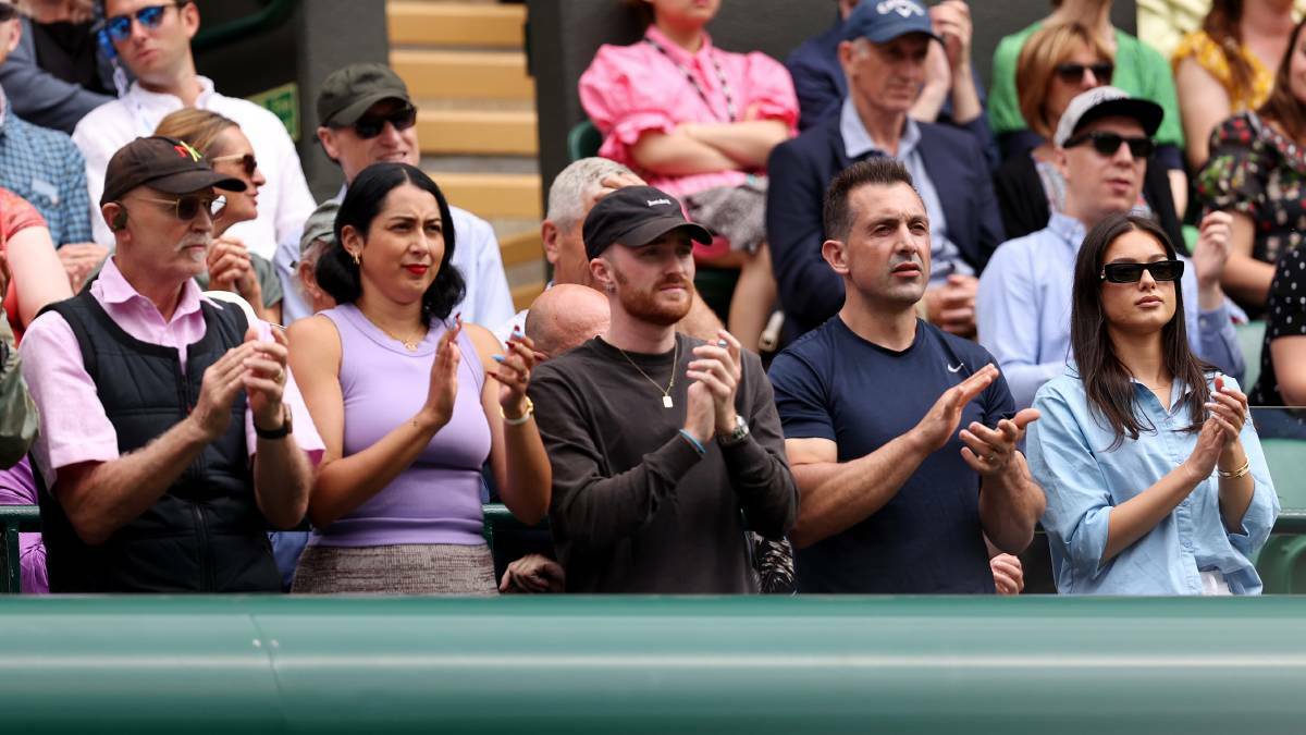 Will Maher (blue shirt, second from right) in Nick Kyrgios' supporter box in 2022. Picture Getty Images