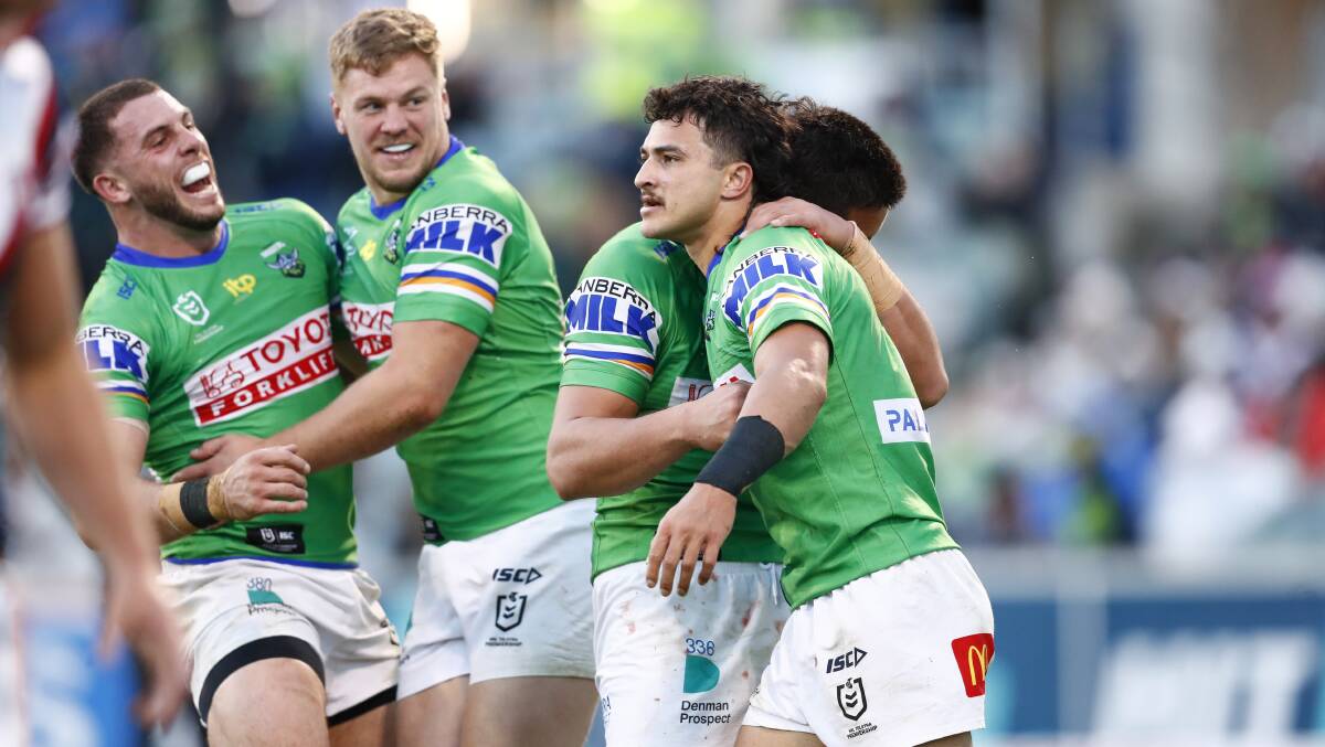 Raiders players congratulate Xavier Savage after his try. Picture: Keegan Carroll