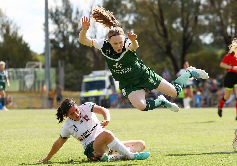 Canberra United's Sasha Grove was sent flying in a tackle. Picture Getty Images
