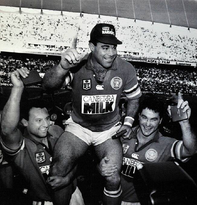 Mal Meninga is hoisted on the shoulders of teammates at the Sydney Football Stadium in 1994. Picture ACM