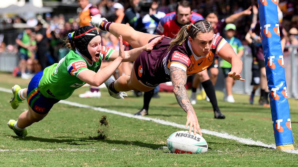Brisbane winger Julia Robinson scores for the Broncos, who were far too strong for the Raiders. Picture Getty Images