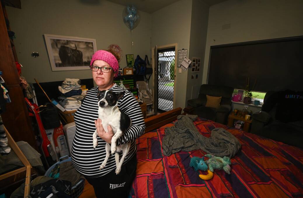 STRUGGLING: Leearna Cook and her best friend Mitch stay at a Wodonga motel during her long wait for suitable accommodation. Picture: MARK JESSER