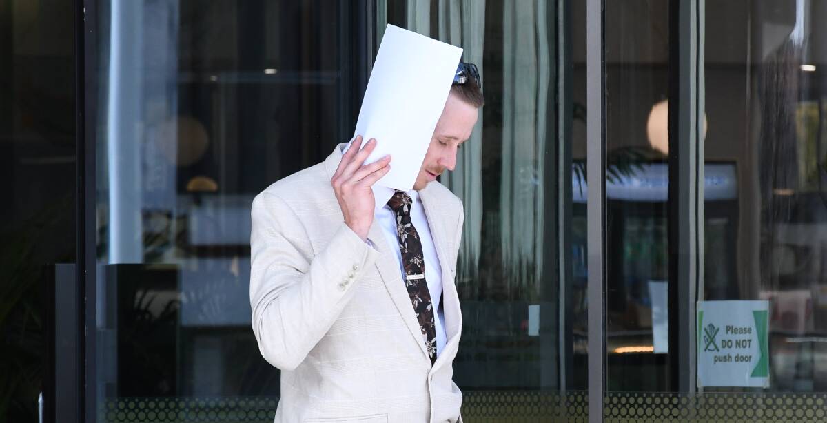 Aiden Paff fails to hide his face from a media camera on Friday. Picture by Tim Piccione 