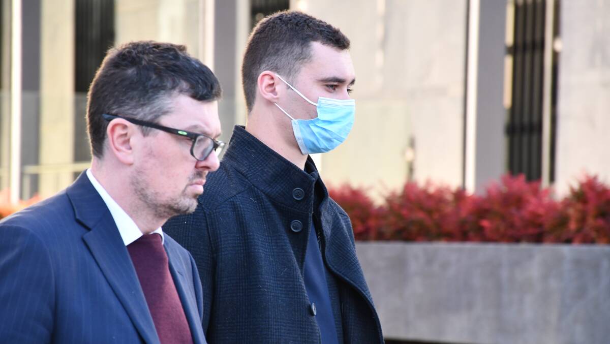 Nathan Austin, right, who was found not guilty, leaves court last week with solicitor Michael Kukulies-Smith. Picture by Tim Piccione 