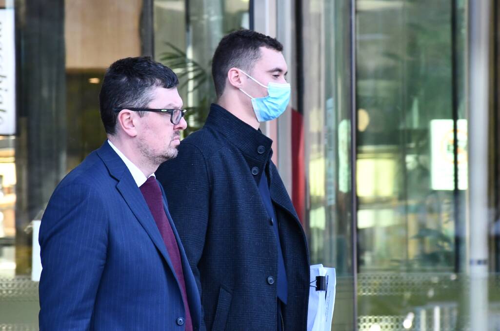 Nathan Austin, right, leaves court last week with solicitor Michael Kukulies-Smith. Picture by Tim Piccione 