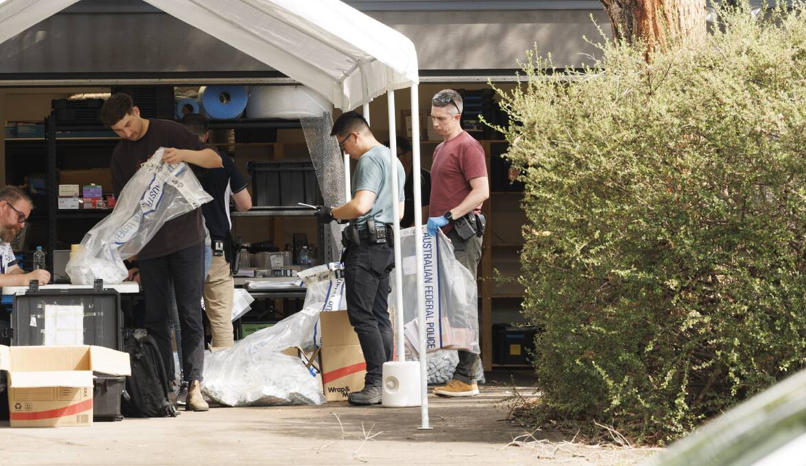 ACT Policing have raided a home in O'Connor, where they claim to have seized drugs from the territory's largest illegal prescription drug distribution operation. Pictures by Keegan Carroll, ACT Policing 