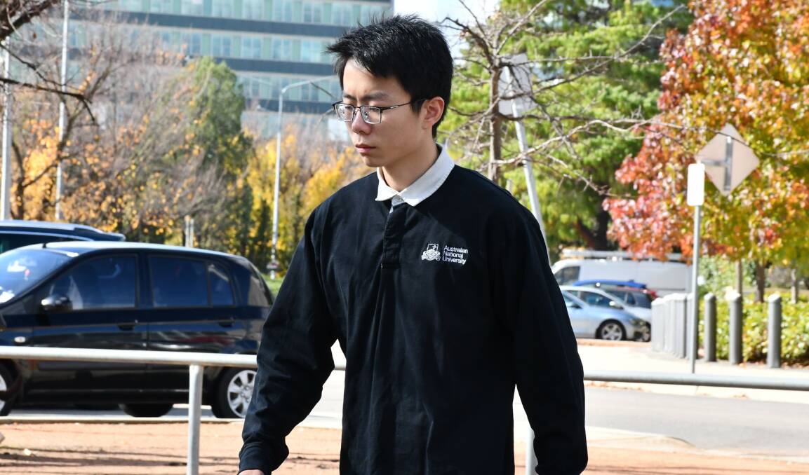 Denghu Ji, leaves court on Thursday wearing an ANU jumper. Picture by Tim Piccione 