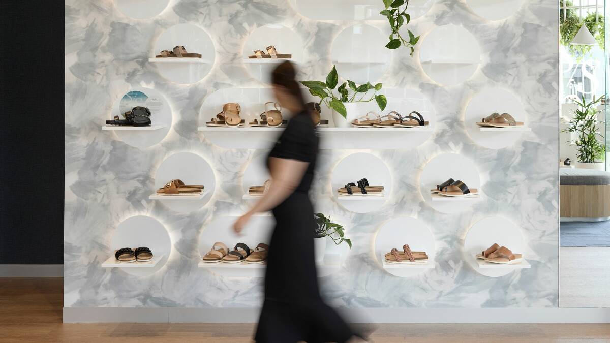 A new FRANKIE4 store will open in Canberra's Manuka next month. Pictured here, a woman walks past a range of shoes from the brand. Picture supplied