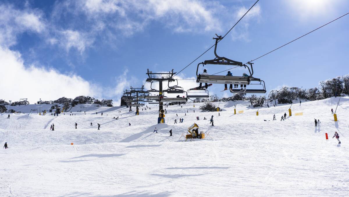 People gather at the Perisher Ski Resort to enjoy the snow. Picture by Dion Georgopoulos 