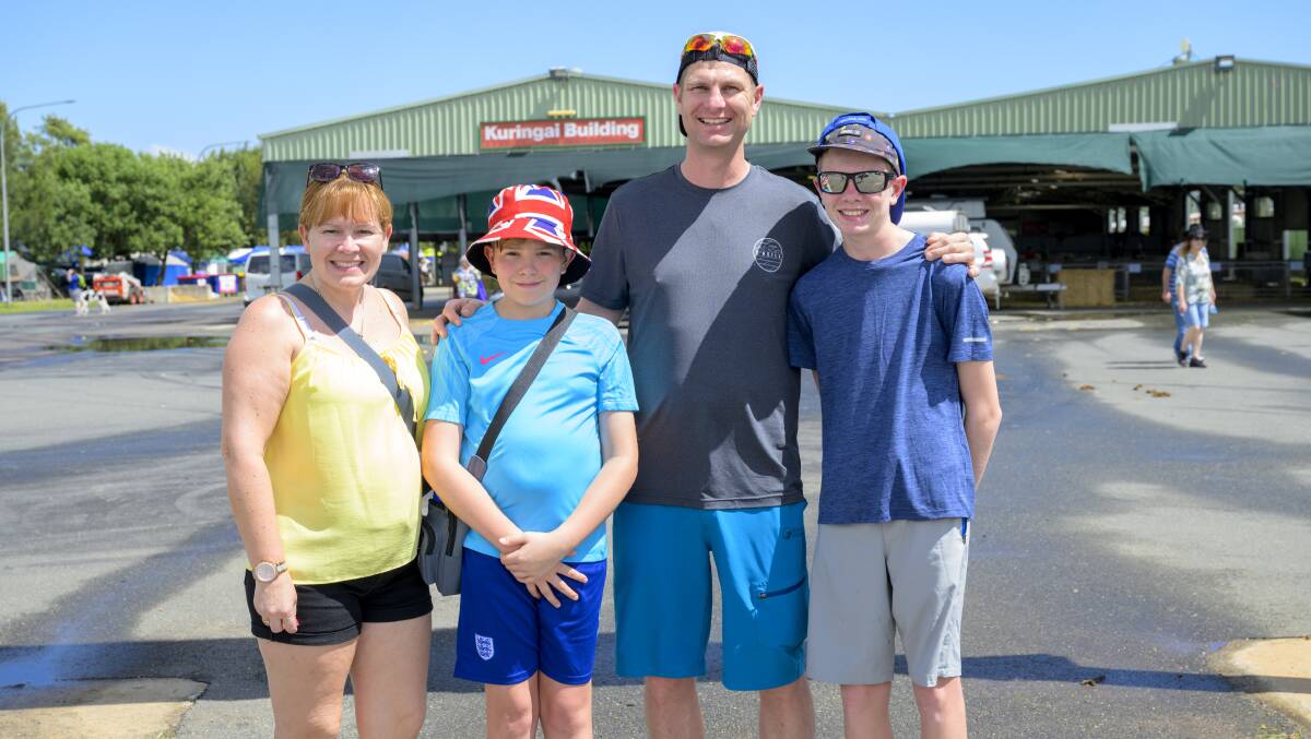 Debbie, Daniel, 11 ,Chris and Matthew Clark,13, from Canada enjoy their first visit to the Royal Canberra show. Picture by Keegan Carroll