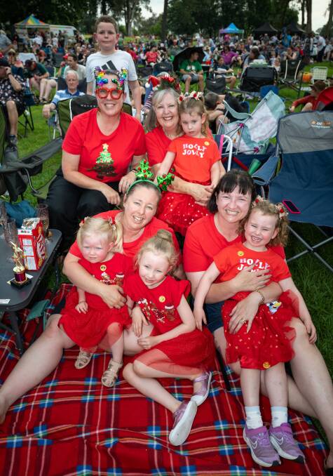 Danielle Hartnett, Susan Hollaway with Mollie, Jessica and Vanessa Miller, with Rebecca and Enid Hollaway at Carols by Candlelight. Picture by Elesa Kurtz