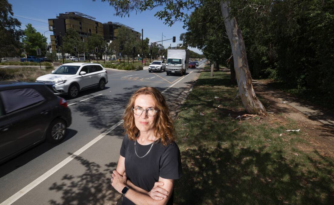 Joanne Pybus stands at the Northbourne Avenue location where her husband was struck by a vehicle while cycling. Picture by Sitthixay Ditthavong