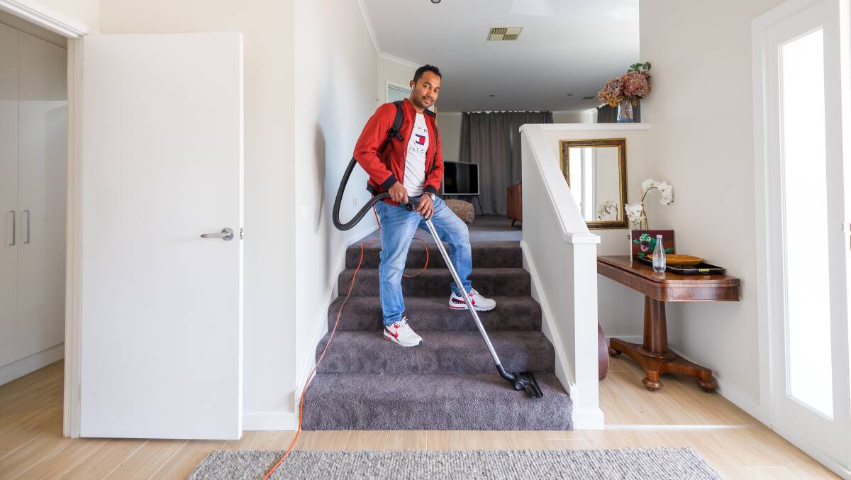 Ras Alam, pictured here at an Airbnb cleaning job, said a growth in short-term rentals had been good for his business. Picture by Sitthixay Ditthavong