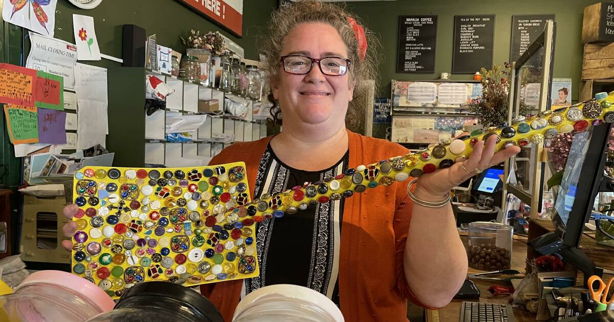 The gift store at the Pomonal General Store has something for everyone including bejewelled shovels that are made locally. Pictured here is store owner Nadya Miller with one of the shovels . Picture by Sheryl Lowe