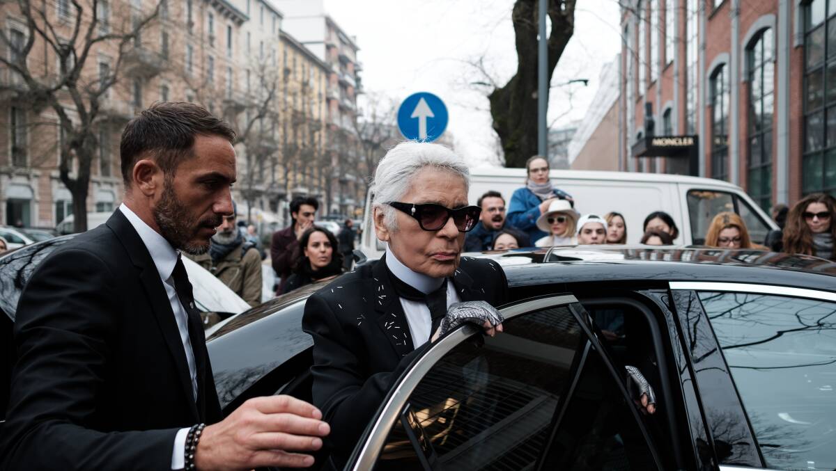 Karl Otto Lagerfeld at the entrance of the Fendi's showroom during Milan Fashion Week in 2017. Picture by Shutterstock.