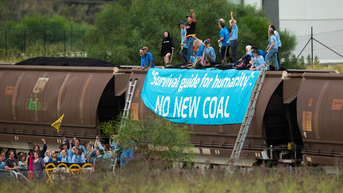 Climate change protesters stopped a coal train from terminating on April 16 2023. Picture by Jonathan Carroll/Newcastle Herald