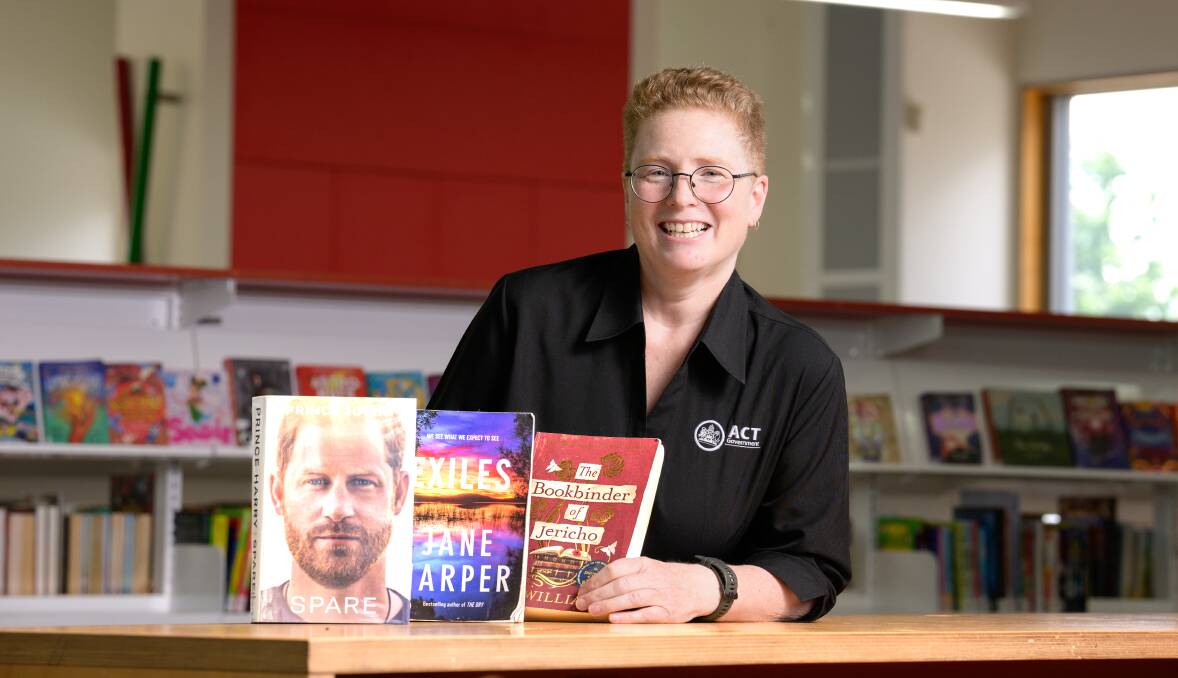 Gungahlin librarian Jaz Beer said Canberrans rushed to borrow Prince Harry's memoir Spare. Picture by Sitthixay Ditthavong