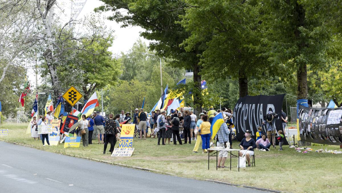 Pro-Ukraine protestors out the front of the Russian embassy in Canberra. Picture by Keegan Carroll