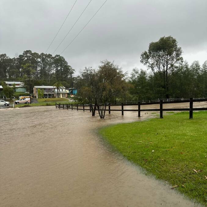 The paddocks on Ms Gibson's property were flooded on Wednesday, November 29. The far left of the picture shows the inundated bridge. Picture supplied