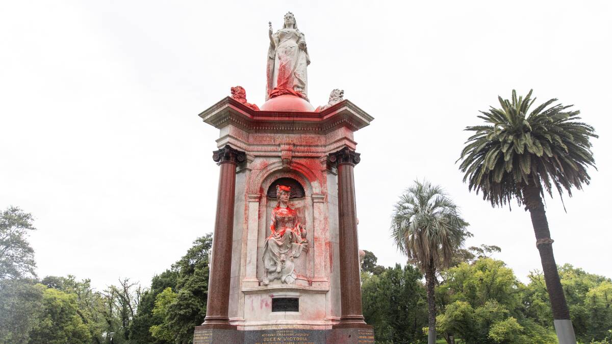 Red paint on the Queen Victoria Memorial in Melbourne's Queen Victoria Gardens on January 25. Picture by AAP Image/Diego Fedele