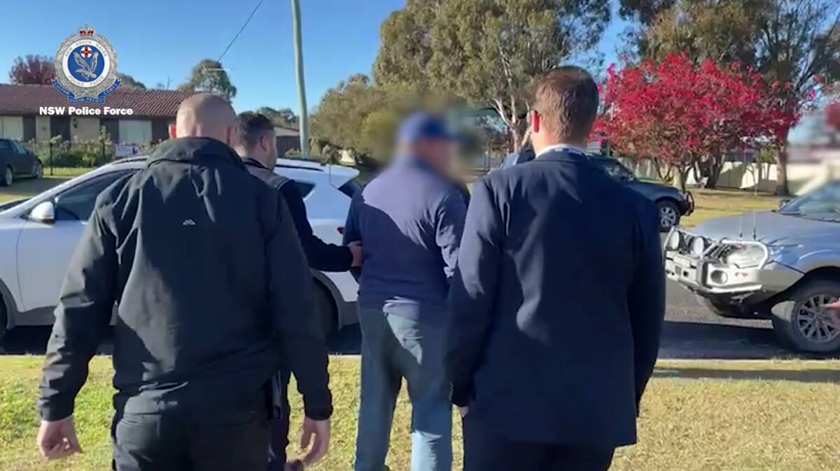 Arson Unit detectives arrest a volunteer firefighter in Uralla on May 3. Picture by NSW Police Force.